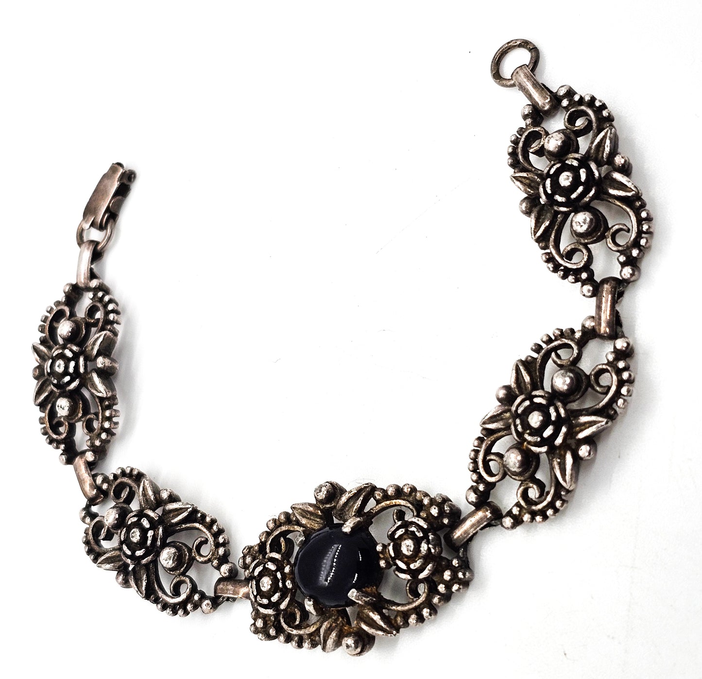 Filigree open work floral vintage panel bracelet with black stone accent