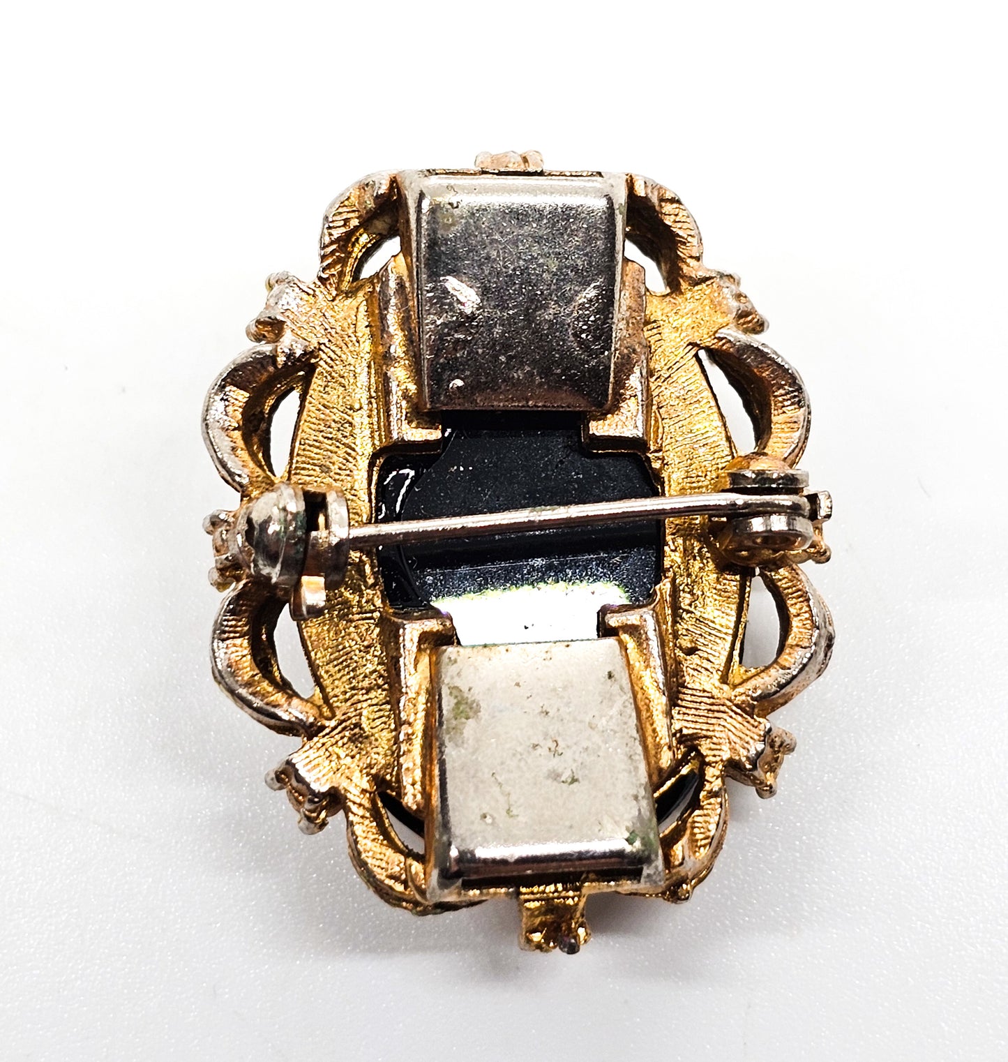 Carved Hematite cameo gold toned faux pearl and rhinestone vintage clasp brooch