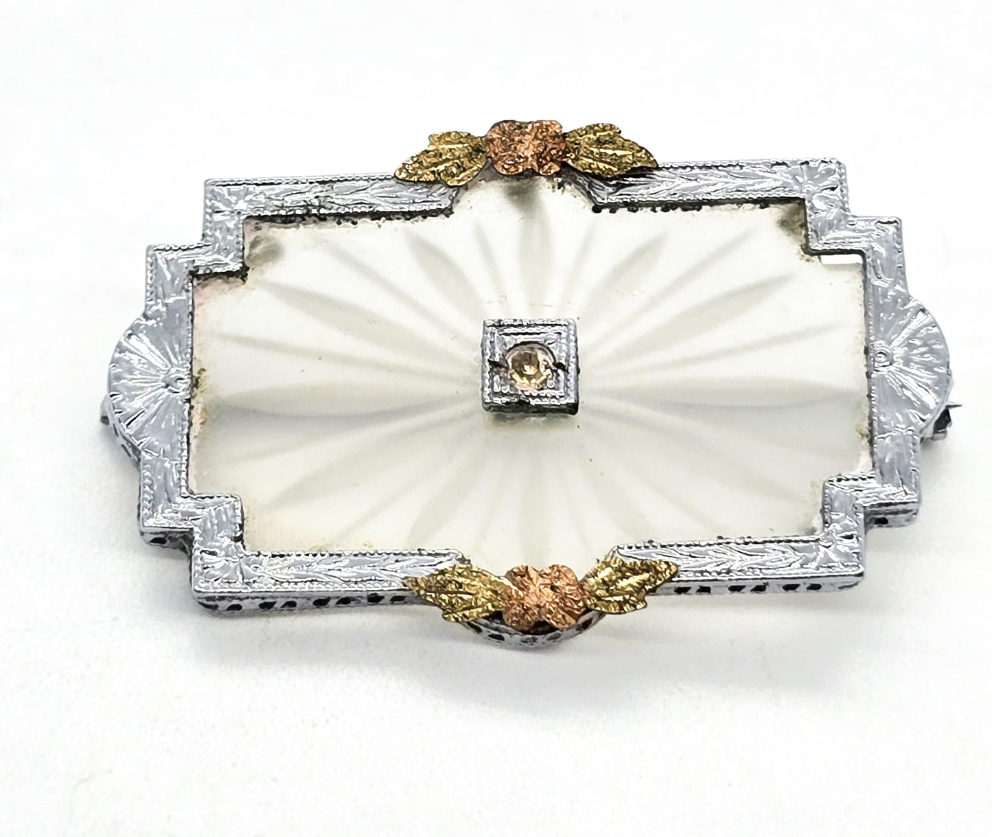 Rhodium plated camphor glass rhinestone brooch with gold overlay flower accents