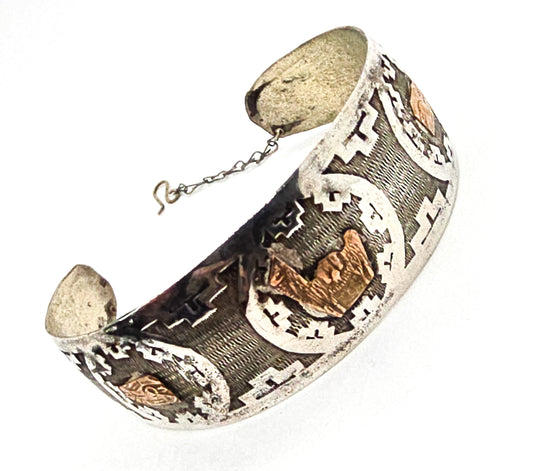 Peruvian alpaca silver and gold toned storyteller vintage cuff bracelet with chain