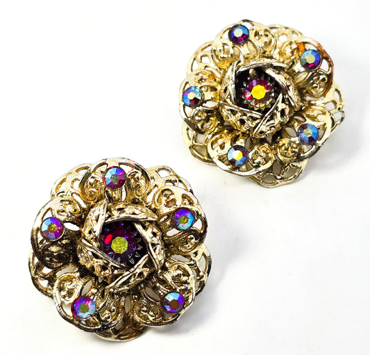 Sarah Coventry red Aurora Borealis rainbow gold toned filigree flower clip on earrings