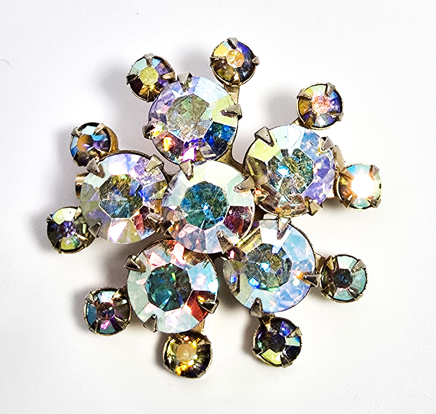 Aurora Borealis rhinestone golden star bust vintage mid century brooch