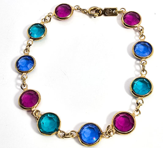 Swarovski signed colored faceted bezel crystal gold toned vintage tennis bracelet