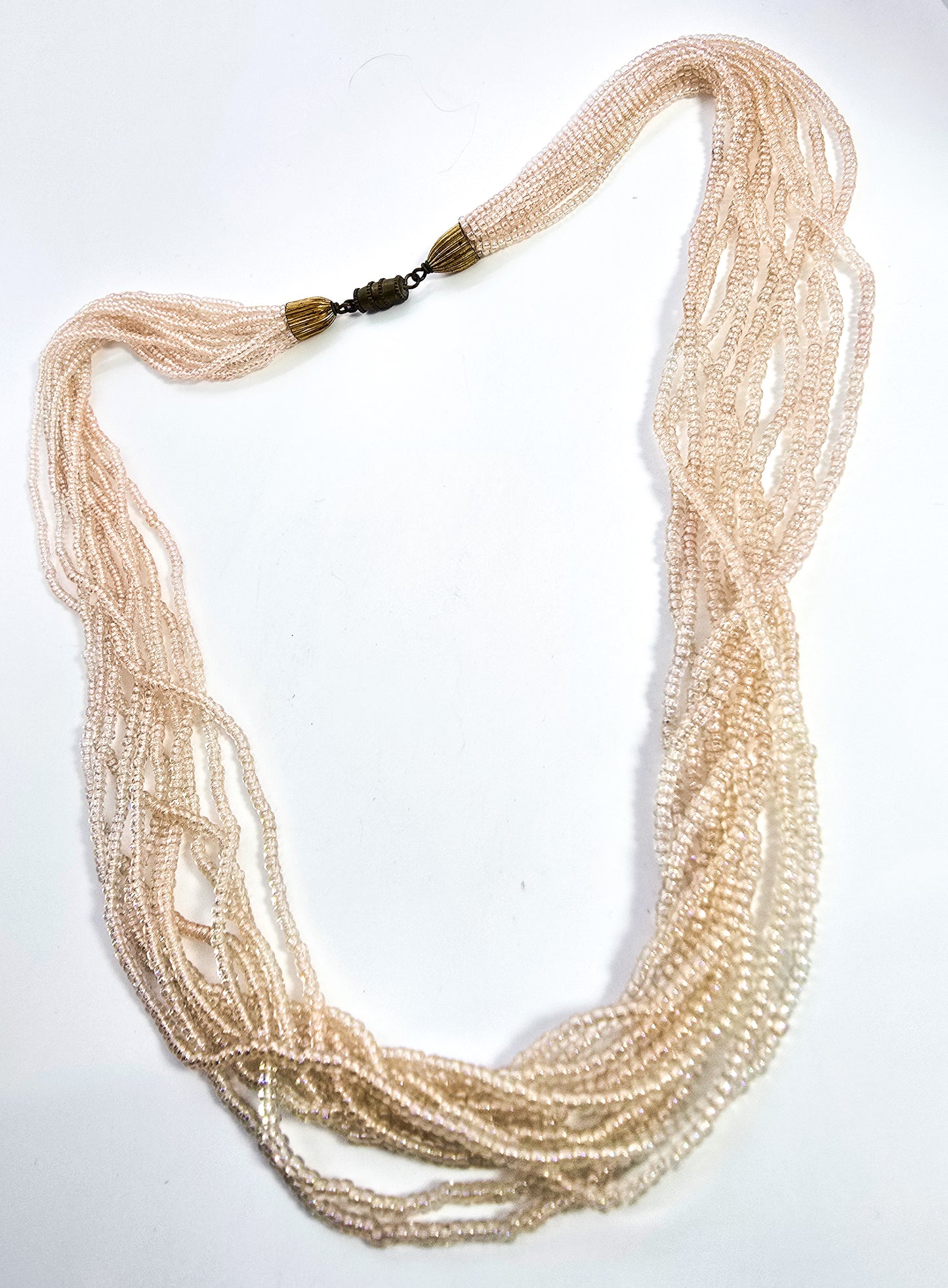 Multistrand Aurora Borealis cream seed bead 11 strand torsade necklace