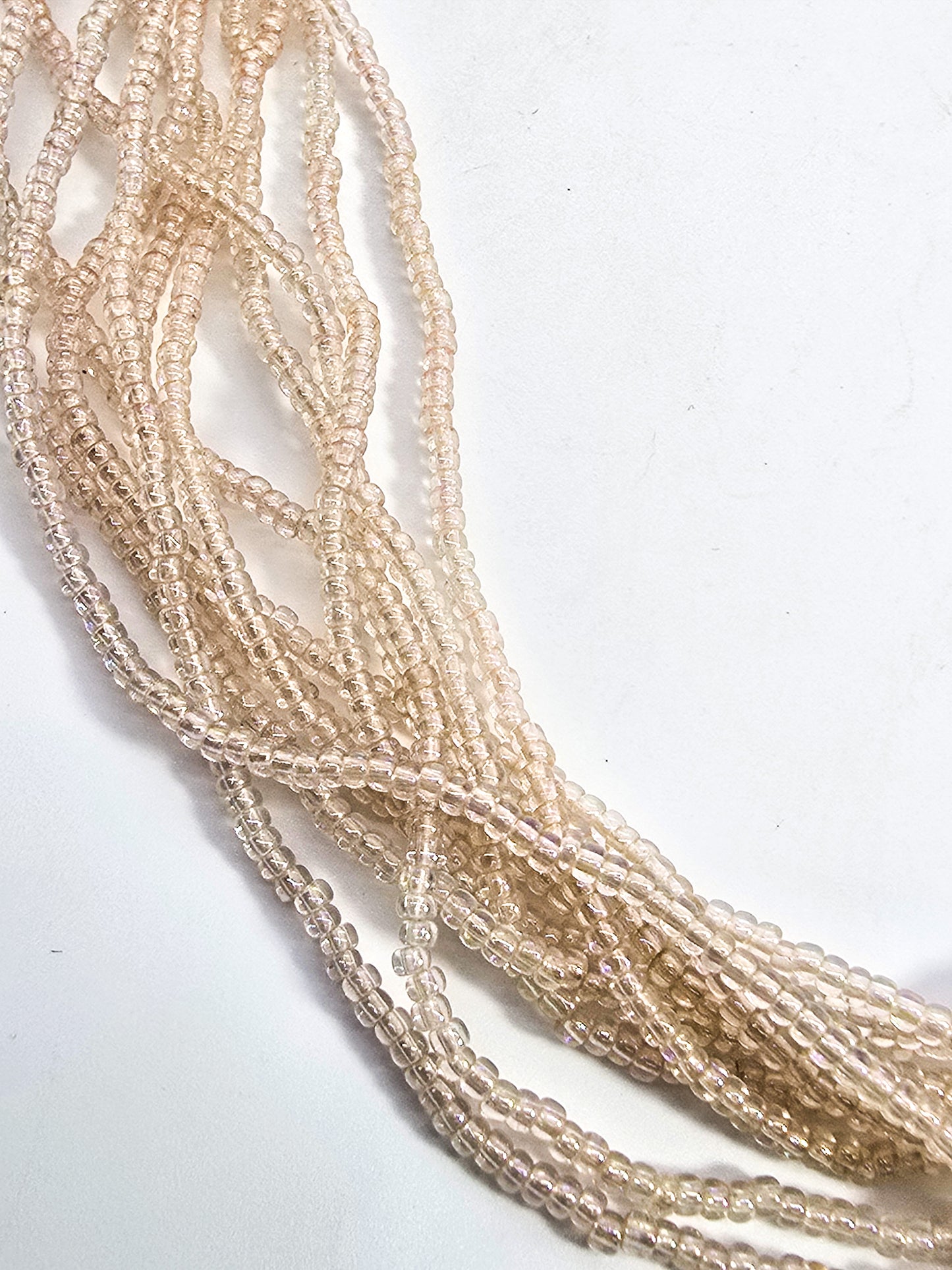 Multistrand Aurora Borealis cream seed bead 11 strand torsade necklace