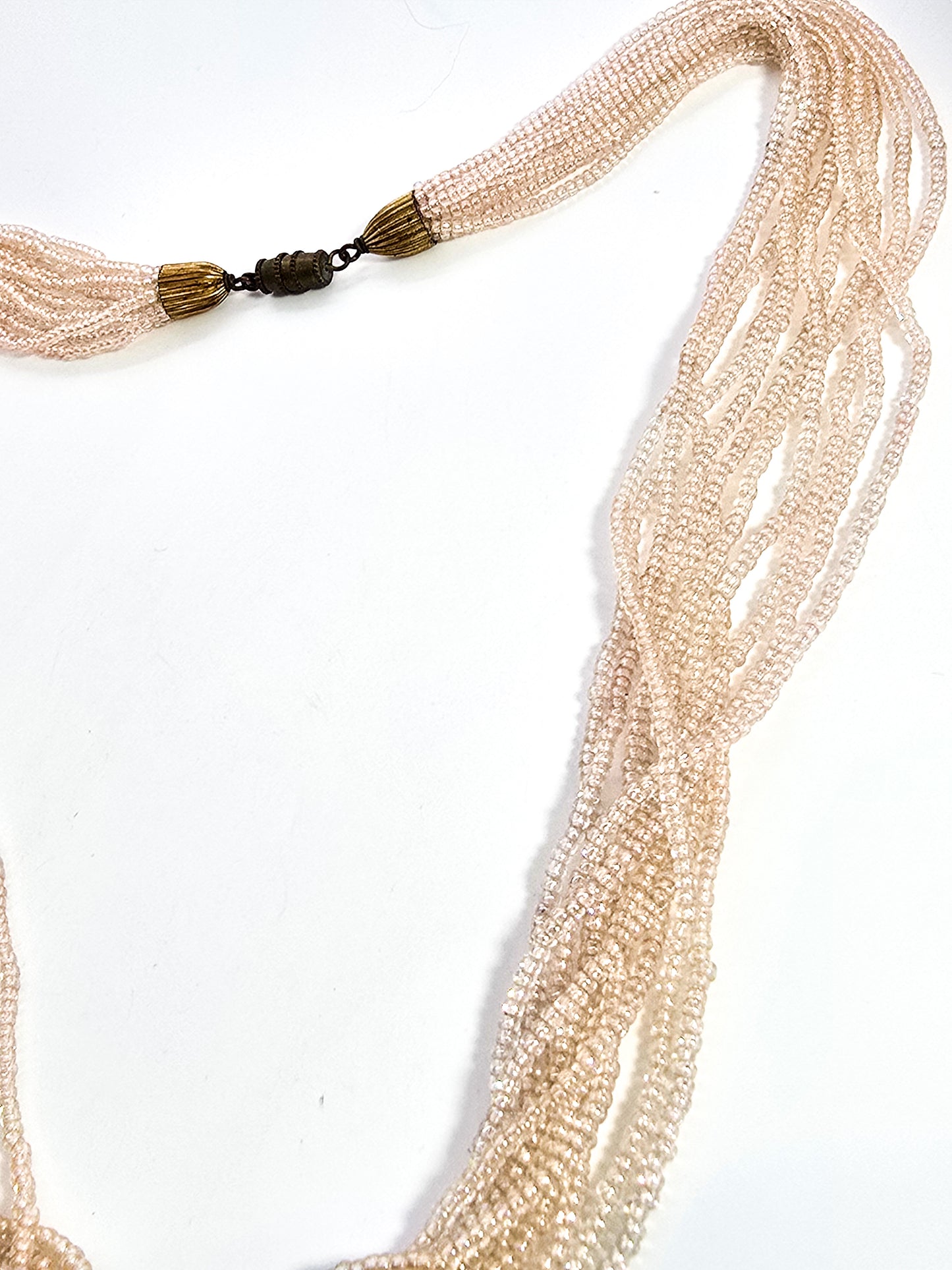 Multistrand Aurora Borealis cream seed bead 11 strand torsade necklace