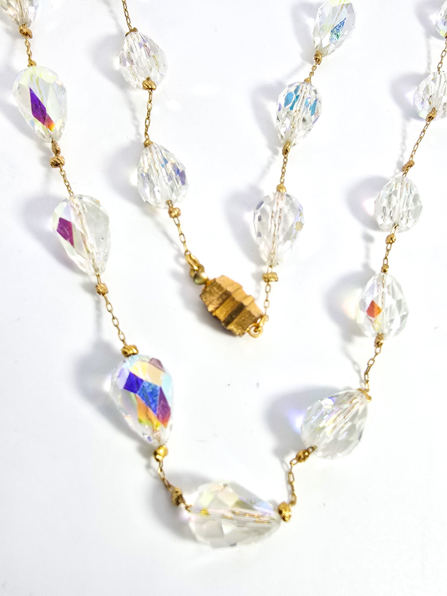 Aurora borealis faceted rainbow gold toned vintage stationary necklace