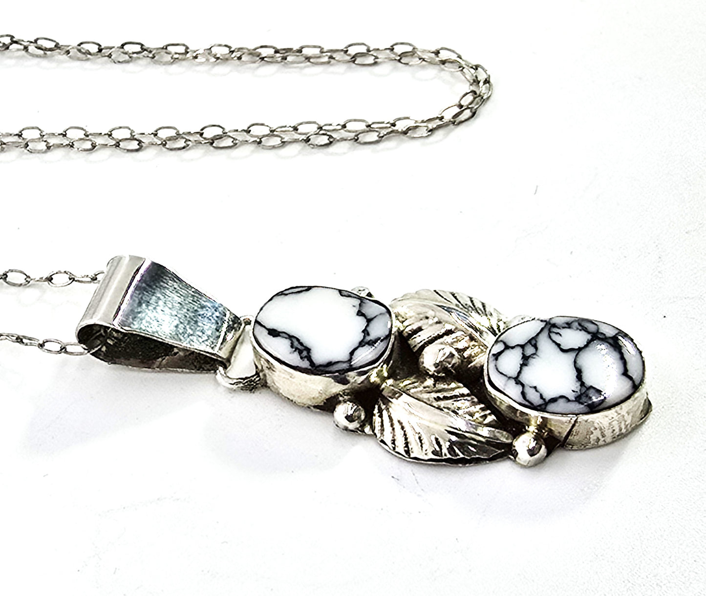 Calvin Spencer White Buffalo Native American Sterling silver Navajo feather necklace