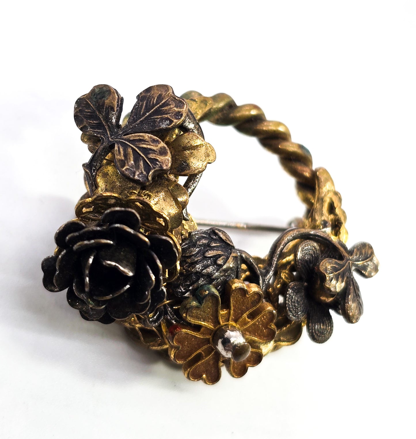 Stanley Hagler stamped brass flower crescent wreath mixed metal vintage brooch