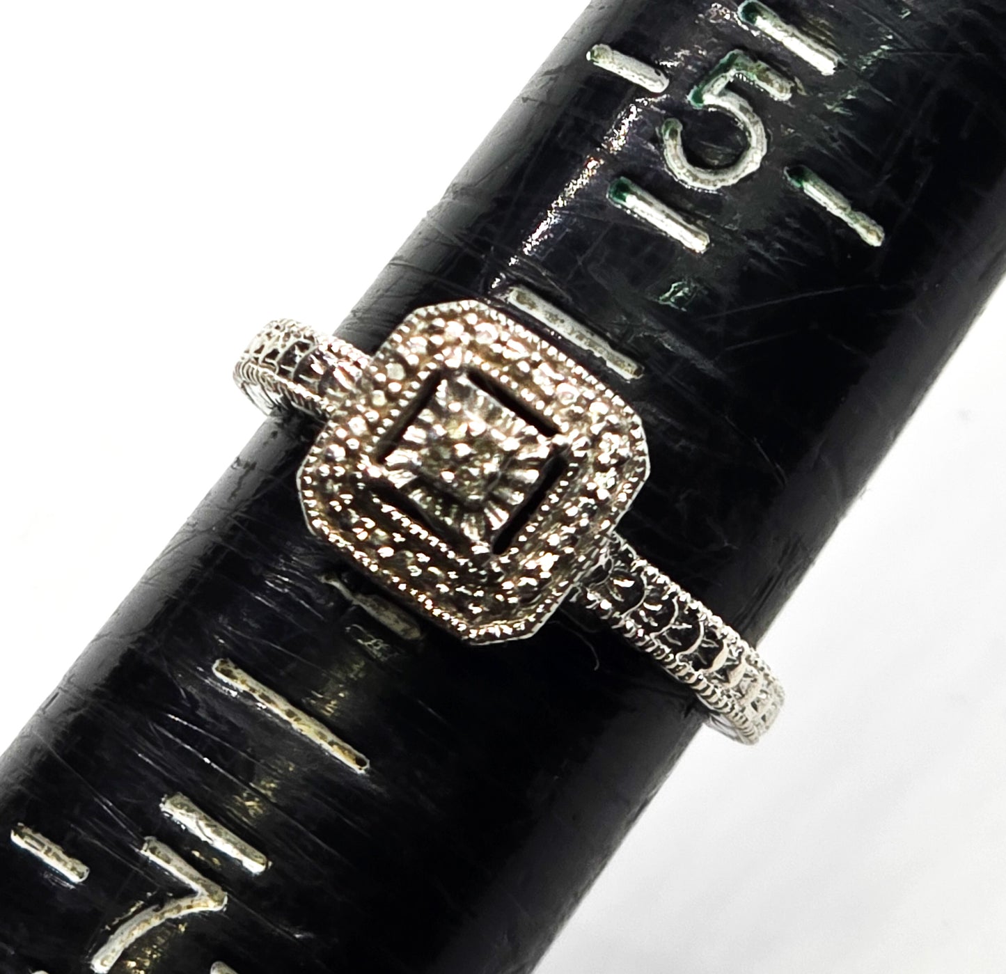 White sapphire embossed sterling silver halo ring size 6 RST IN