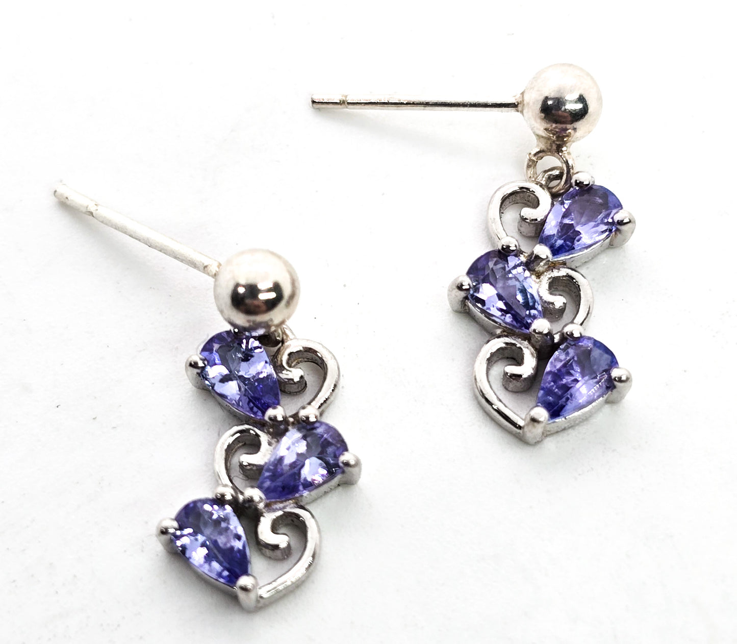 Blue tanzanite triple heart sterling silver drop post earrings