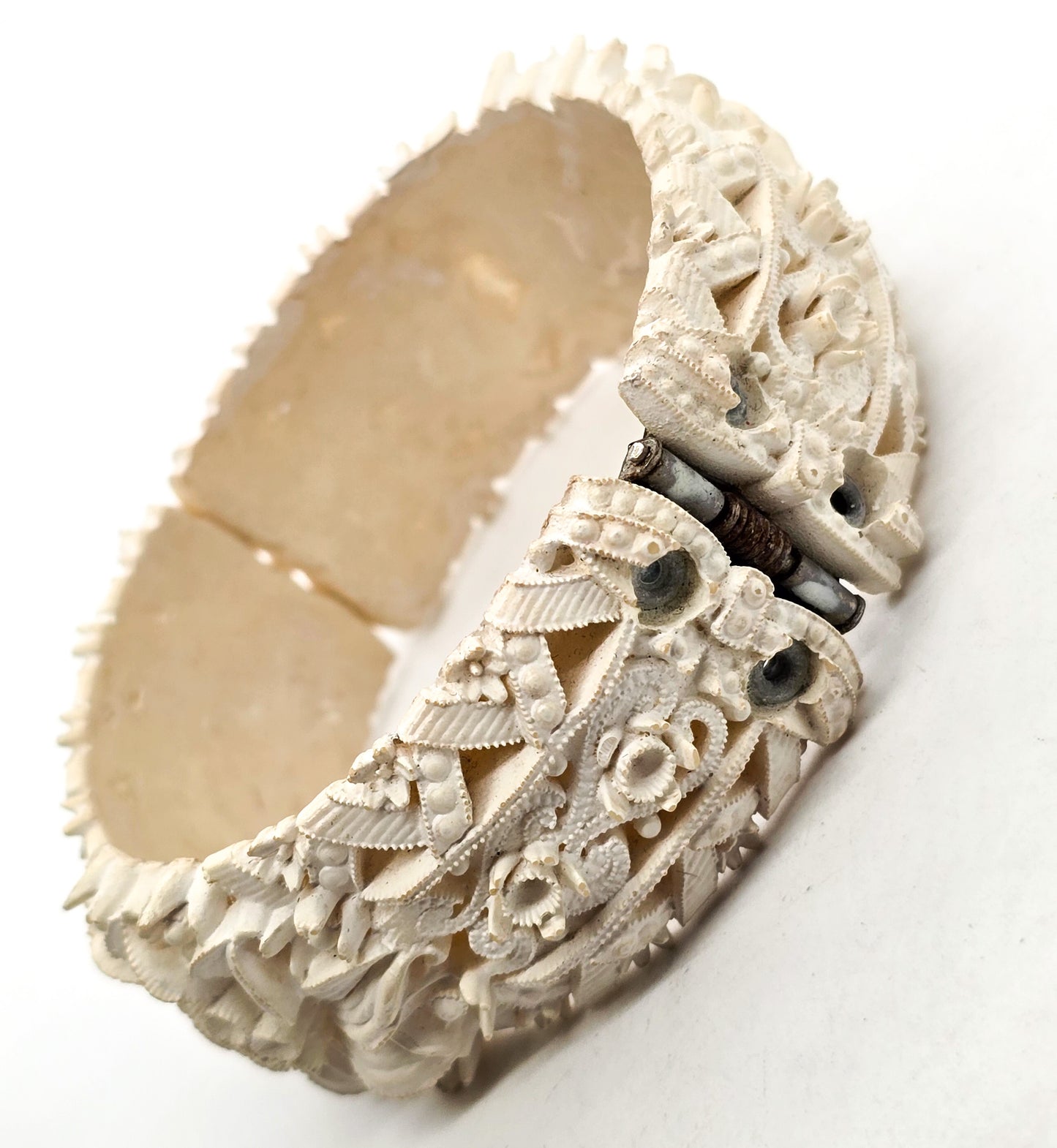 Celluloid carved floral off white hinged vintage clamper bracelet