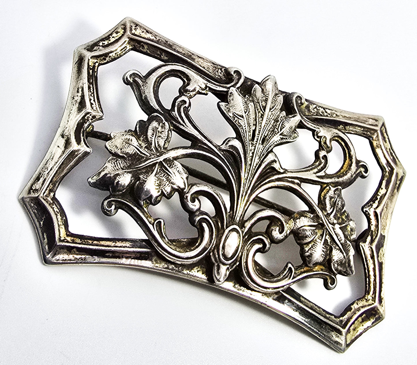 Art Nouveau cartouche repousse sterling silver front antique brooch