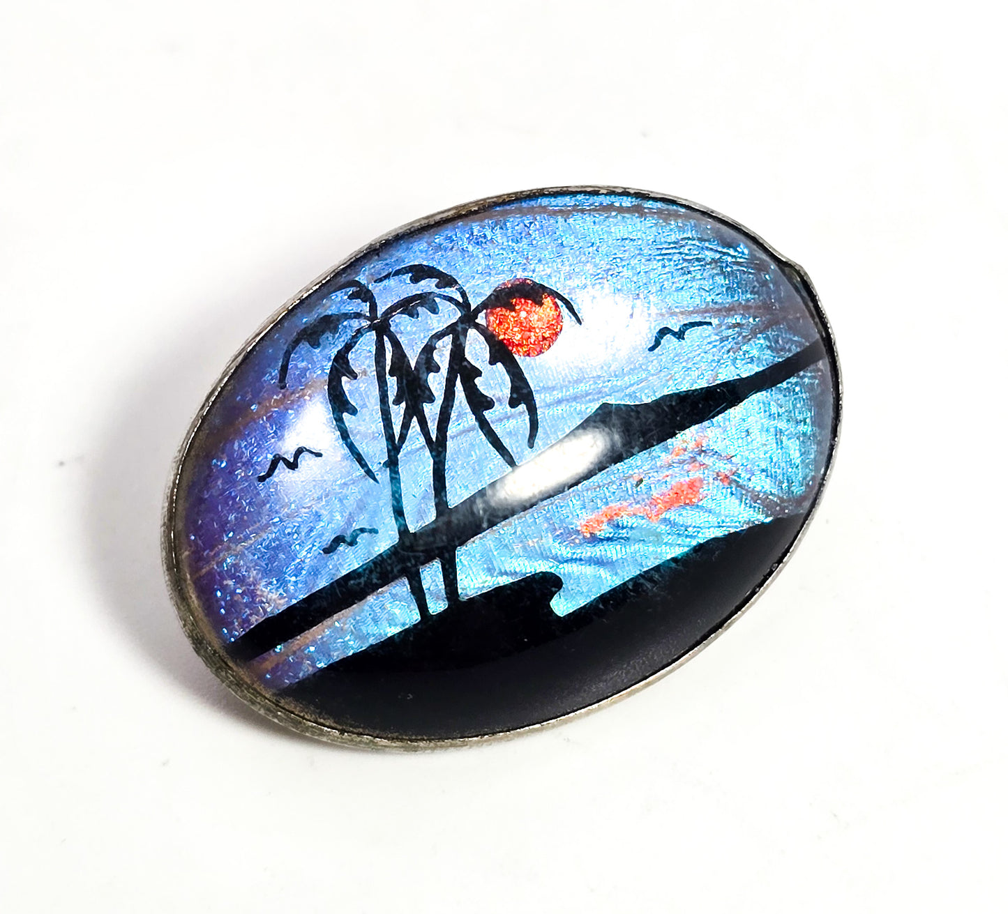Butterfly wing palm tree beach hand painted vintage silver toned oval brooch