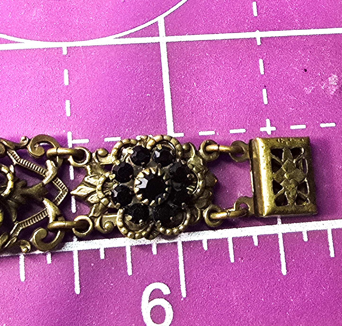 Black rhinestone flower mid century vintage brass rhinestone bracelet
