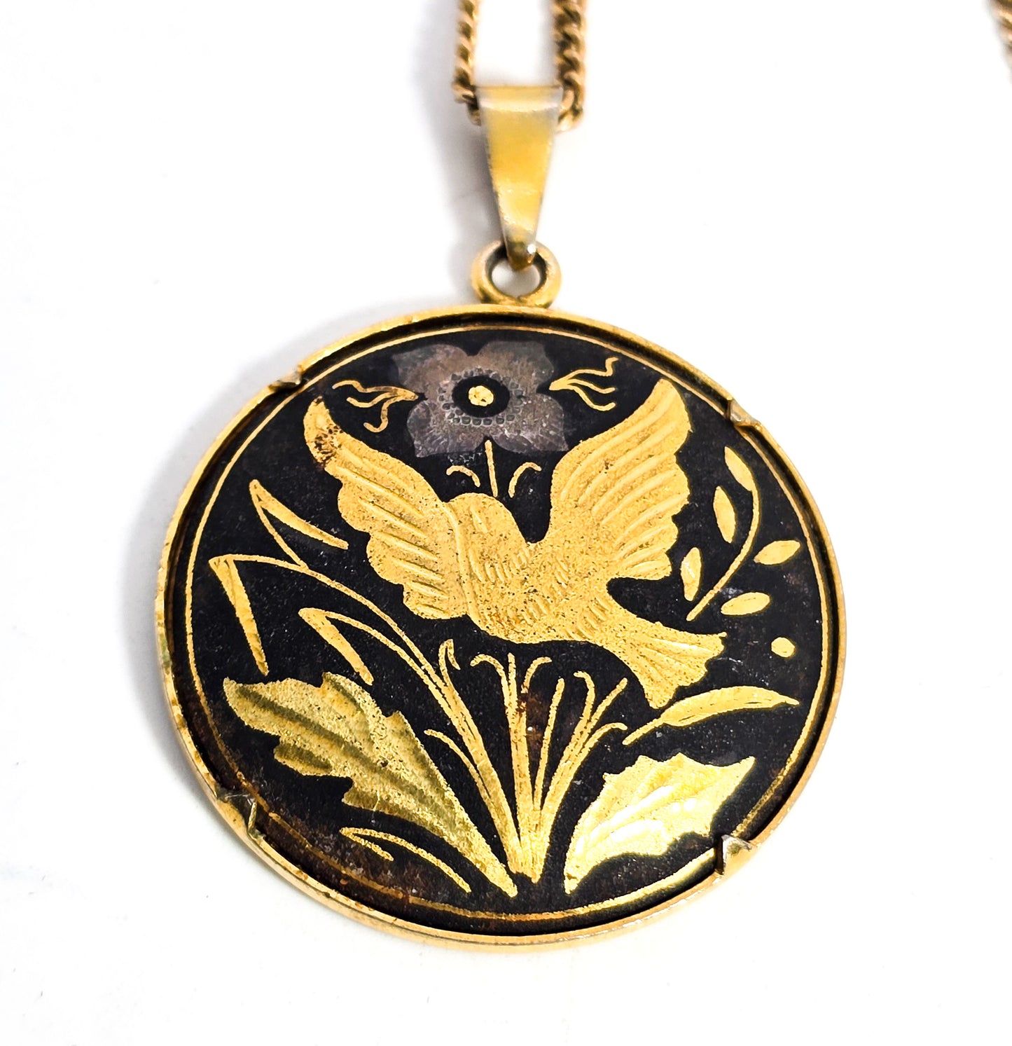 Damascene Flying swallow Black and Gold toned vintage bird necklace