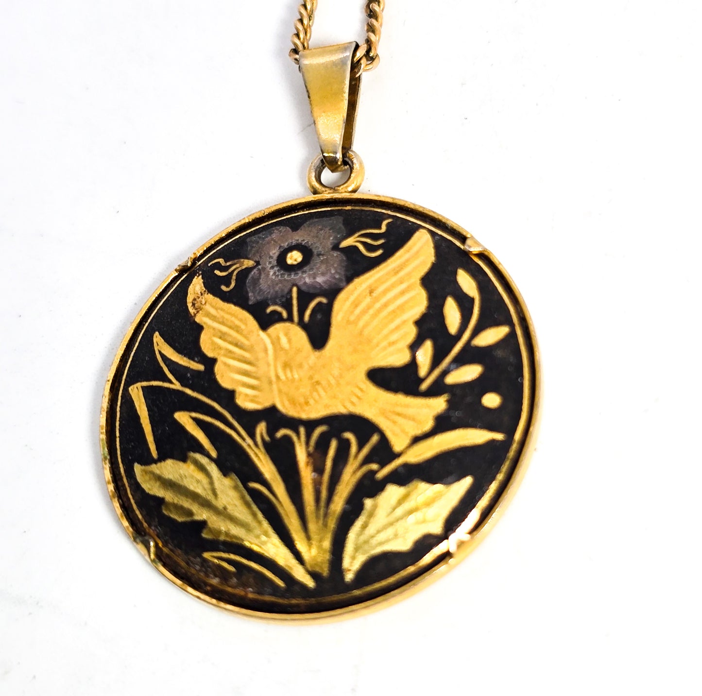 Damascene Flying swallow Black and Gold toned vintage bird necklace