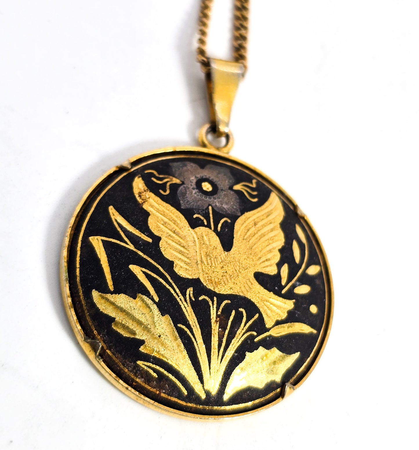 Damascene Flying swallow Black and Gold toned vintage bird necklace