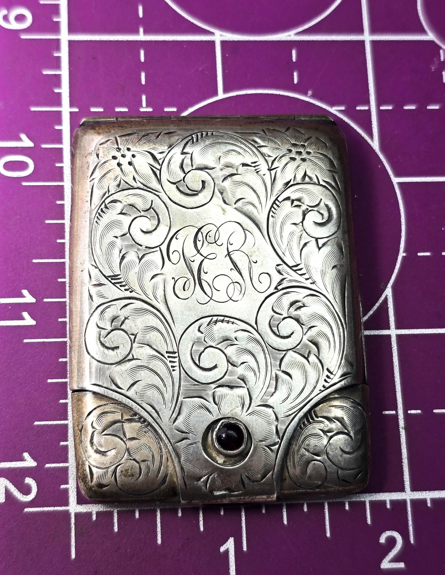 Victorian etched flower hinged antique sterling silver match card safe red button