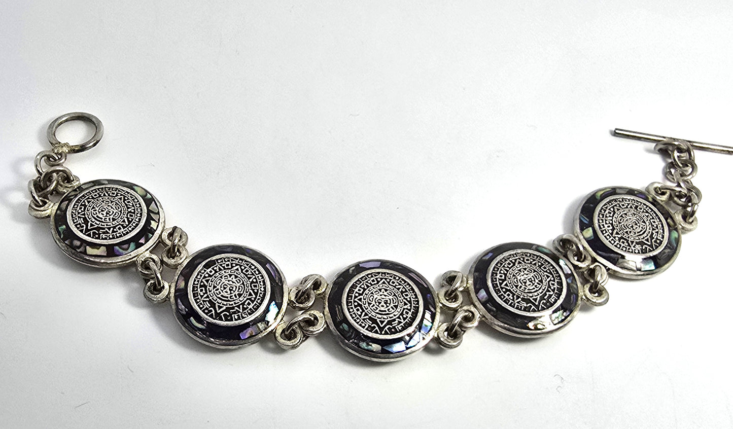 Aztec Calendar Taxco Mexico Abalone inlay sterling silver vintage coin bracelet