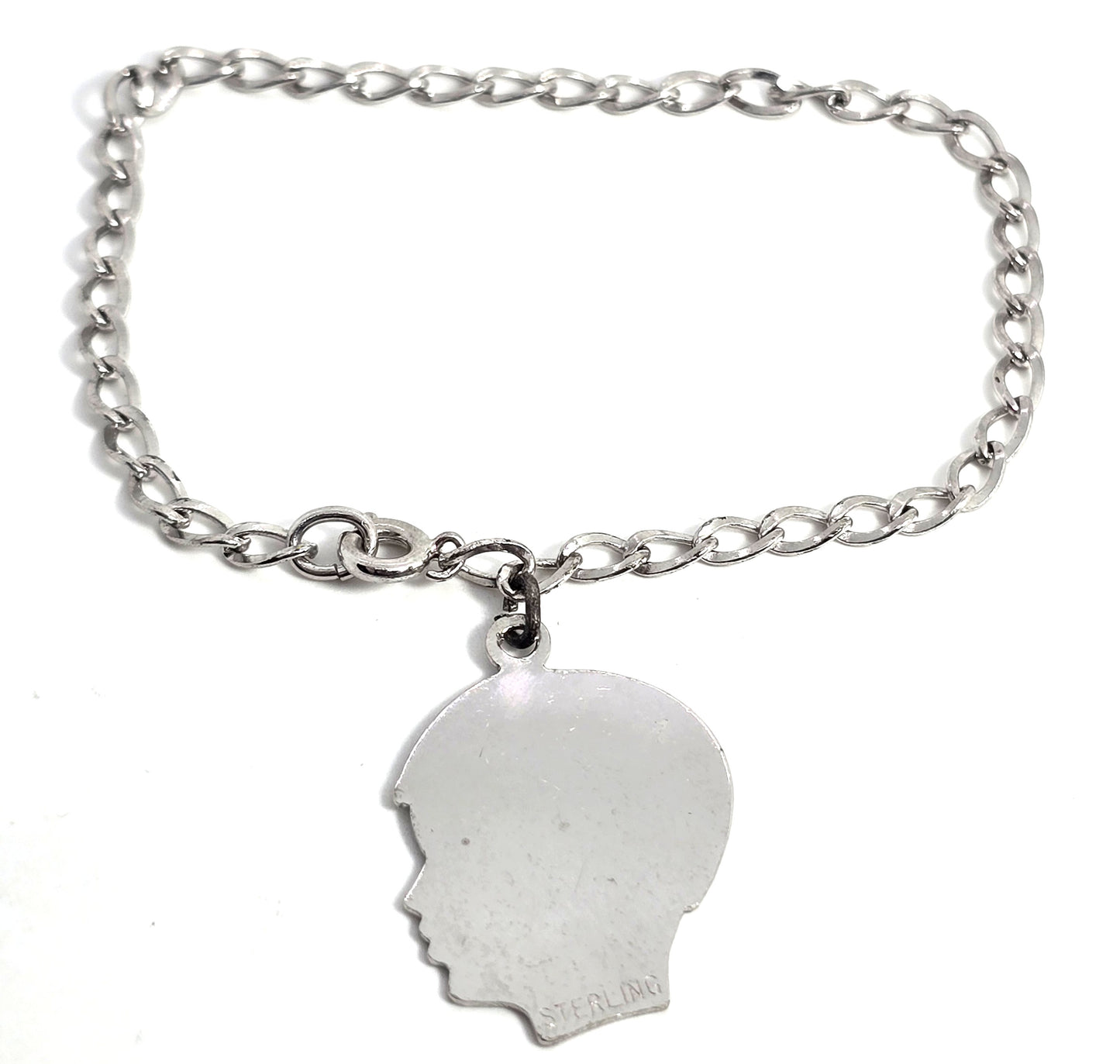 Retro mid century silhouette silver plated charm bracelet Guy 1958
