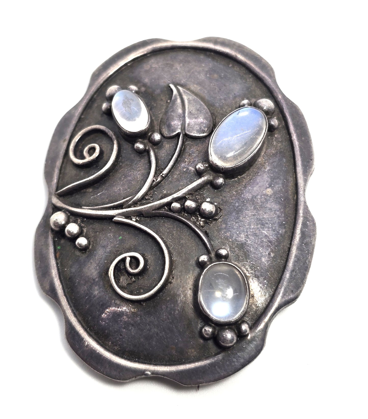 Arts and Crafts blue moonstone flower sterling silver antique brooch