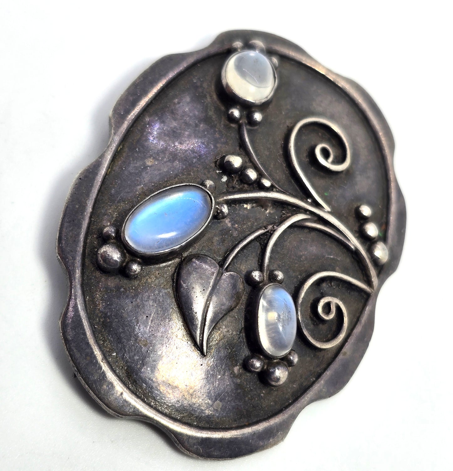 Arts and Crafts blue moonstone flower sterling silver antique brooch