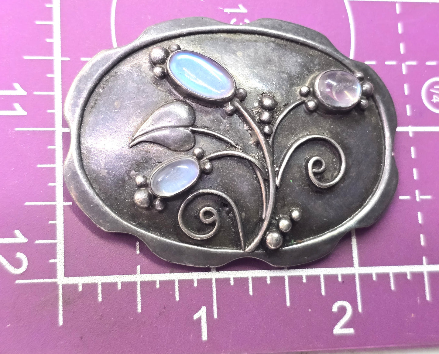 Arts and Crafts blue moonstone flower sterling silver antique brooch