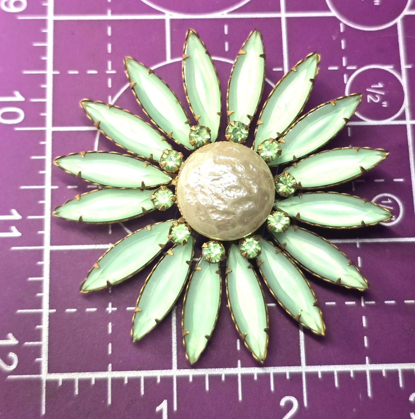 Green satin and uranium glass rhinestone atomic flower vintage brooch mid century