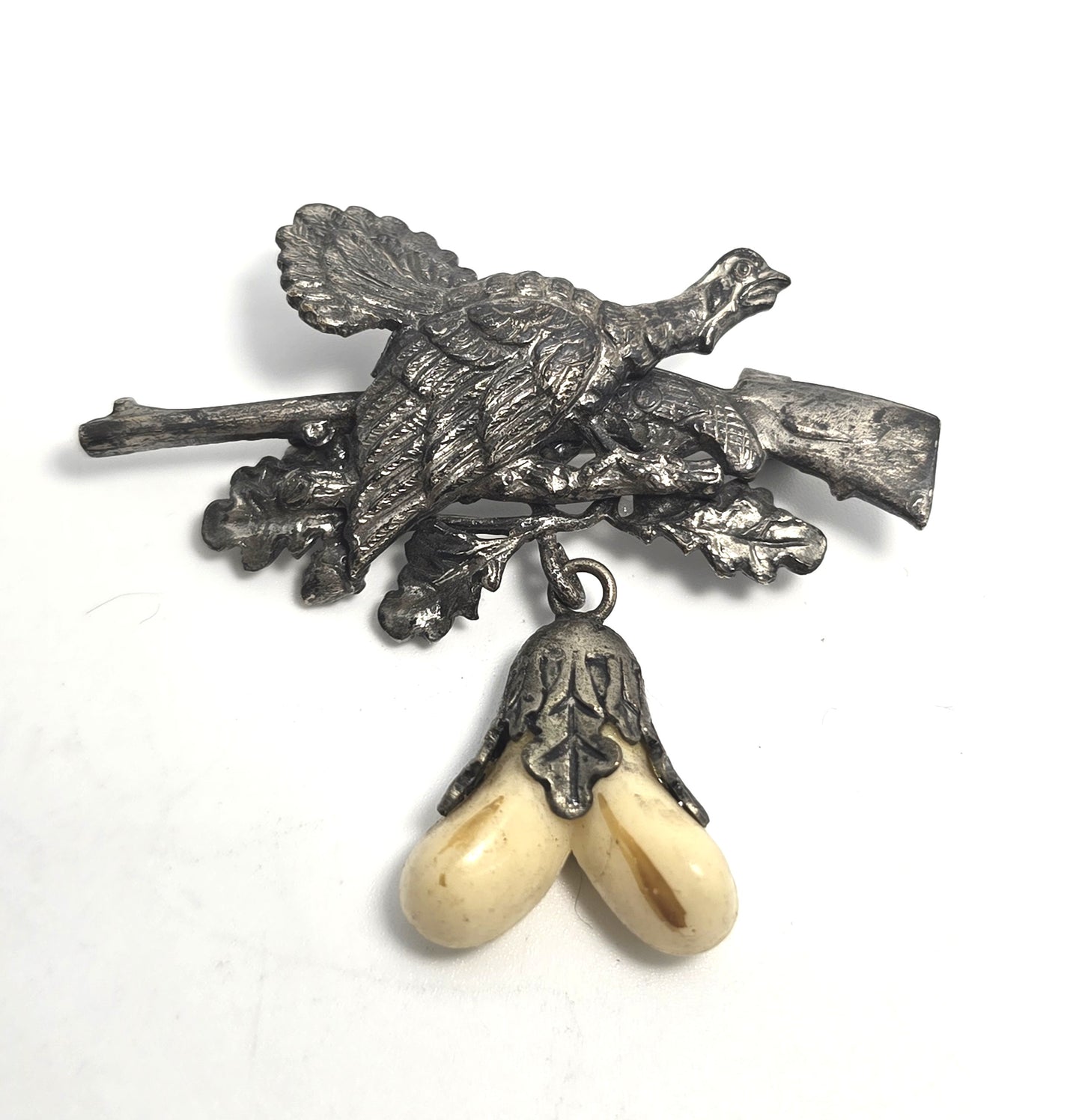 Vintage German Silver Pheasant Rifle Hunting Brooch with Grandel Boar Tusk brooch