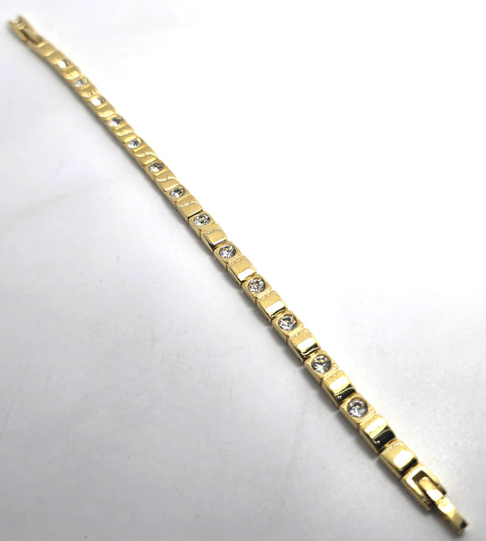 Single row simple clear gold toned vintage rhinestone tennis bracelet