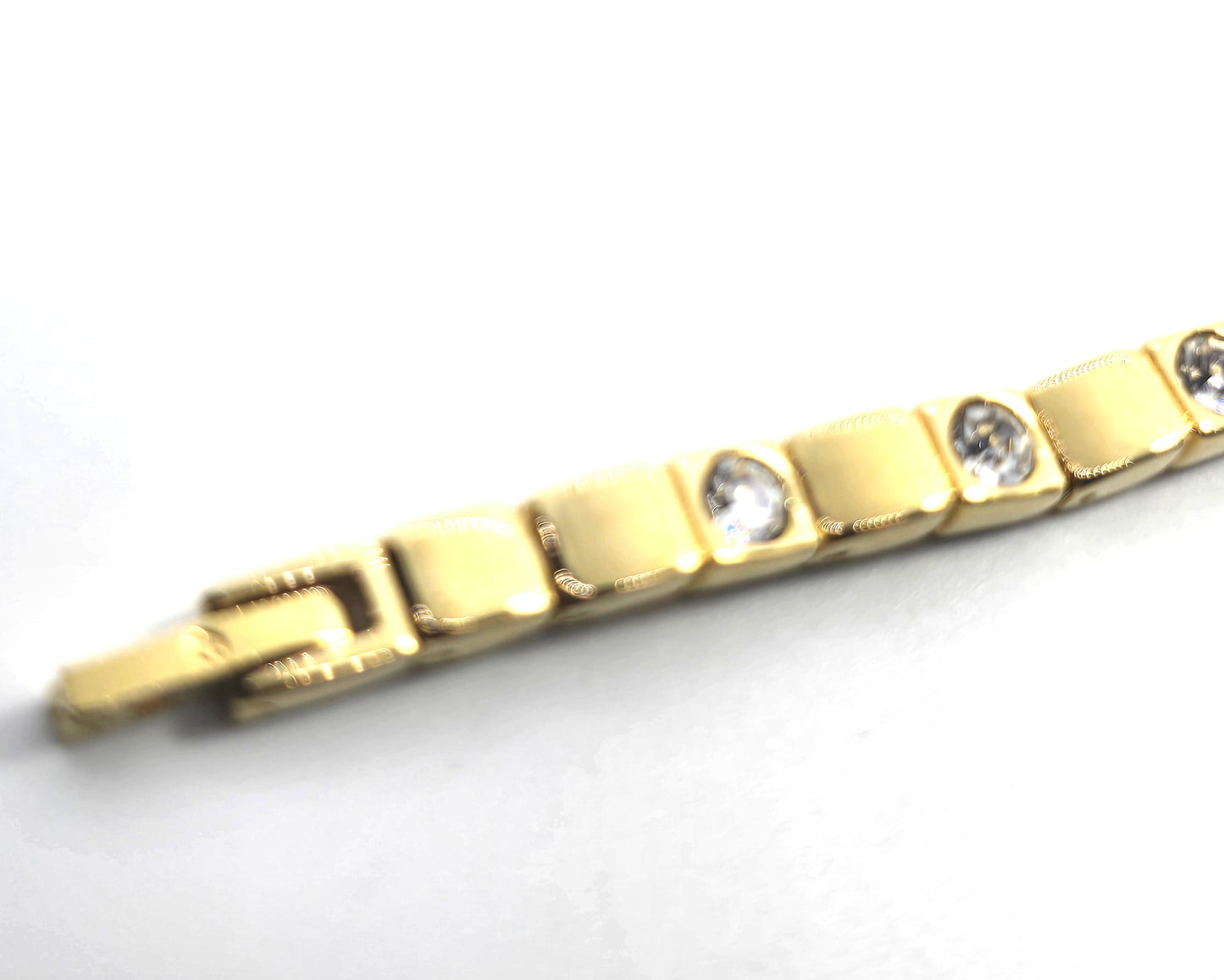 Single row simple clear gold toned vintage rhinestone tennis bracelet