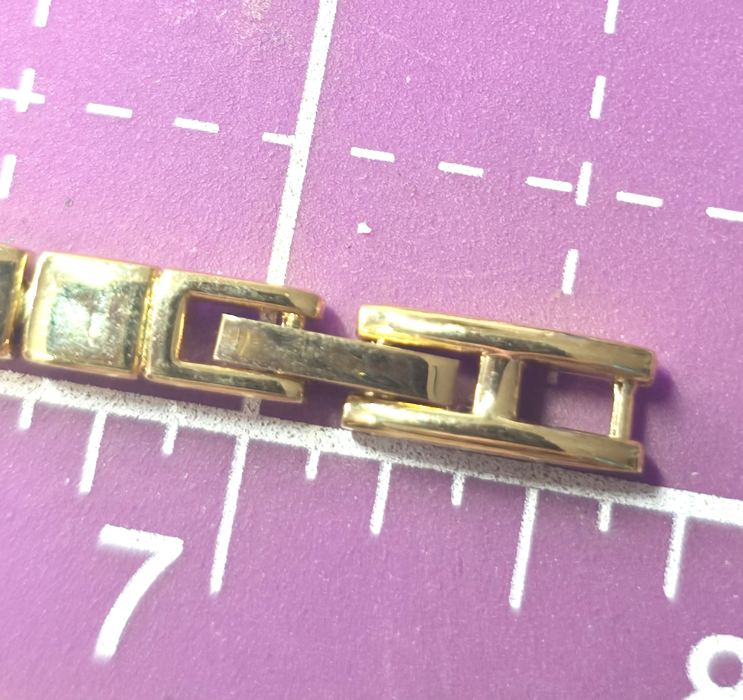 Single row simple clear gold toned vintage rhinestone tennis bracelet