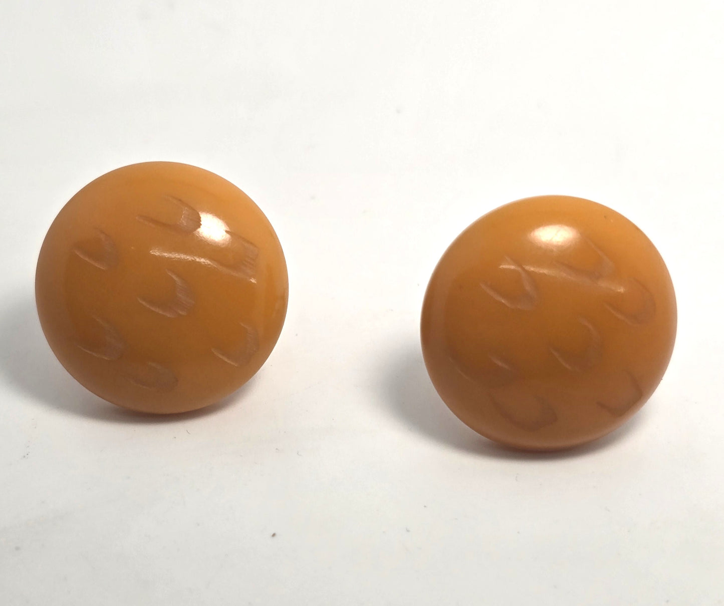 Carved butterscotch Bakelite thick button vintage screw back earrings tested