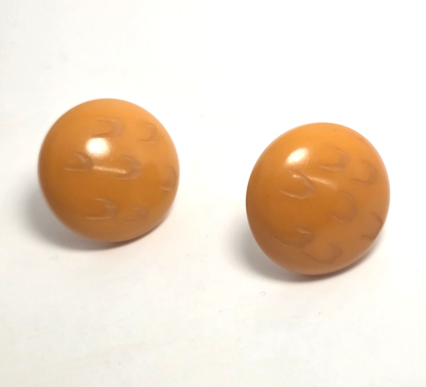 Carved butterscotch Bakelite thick button vintage screw back earrings tested