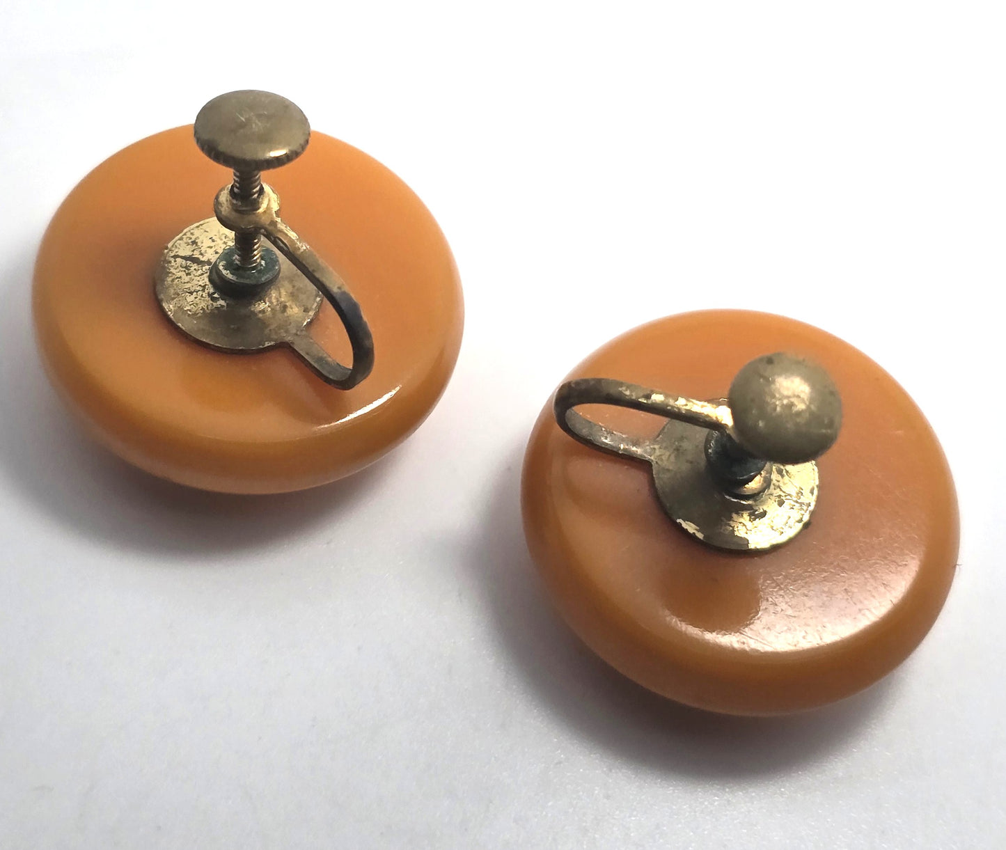 Carved butterscotch Bakelite thick button vintage screw back earrings tested