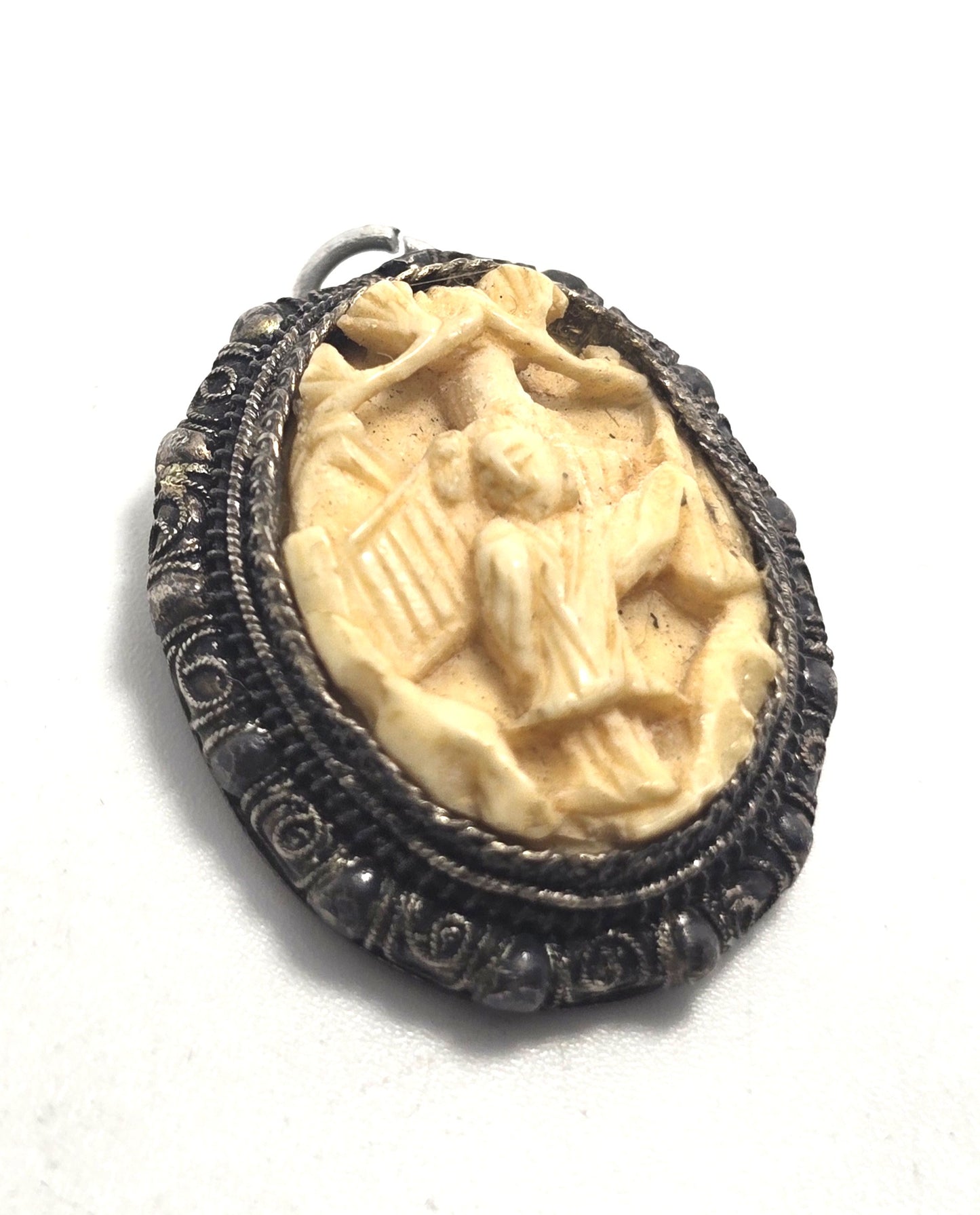 Carved Chinese Export antique sterling silver filigree geisha pendant.