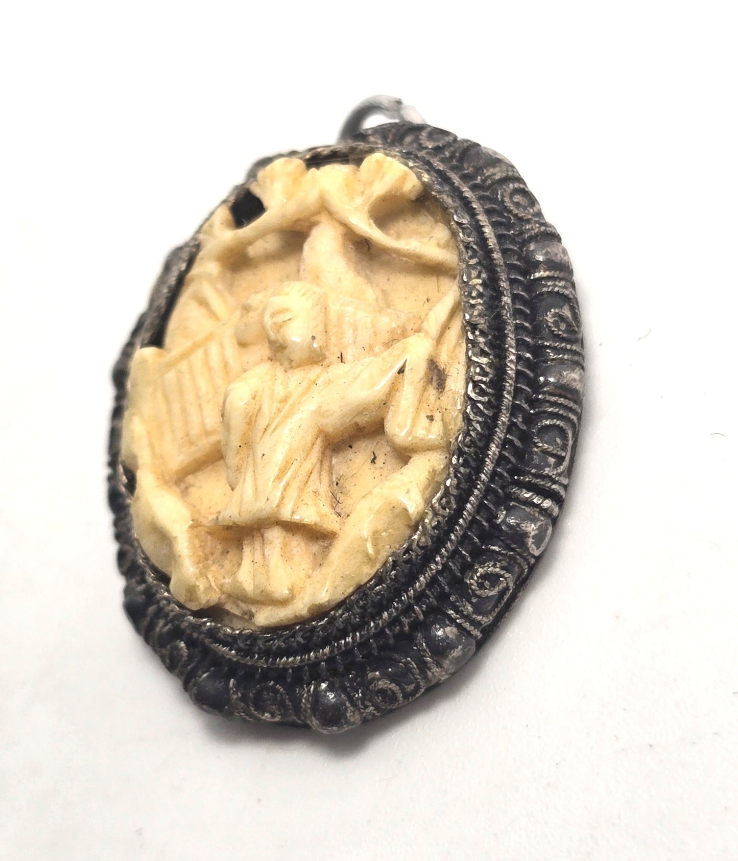 Carved Chinese Export antique sterling silver filigree geisha pendant.