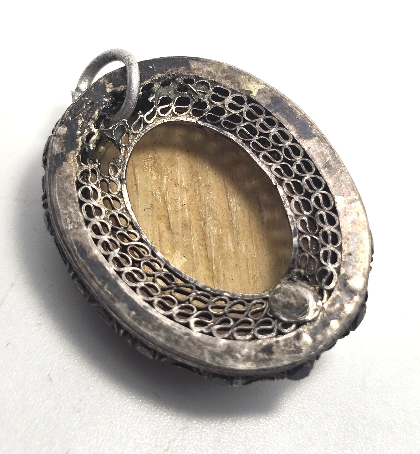 Carved Chinese Export antique sterling silver filigree geisha pendant.