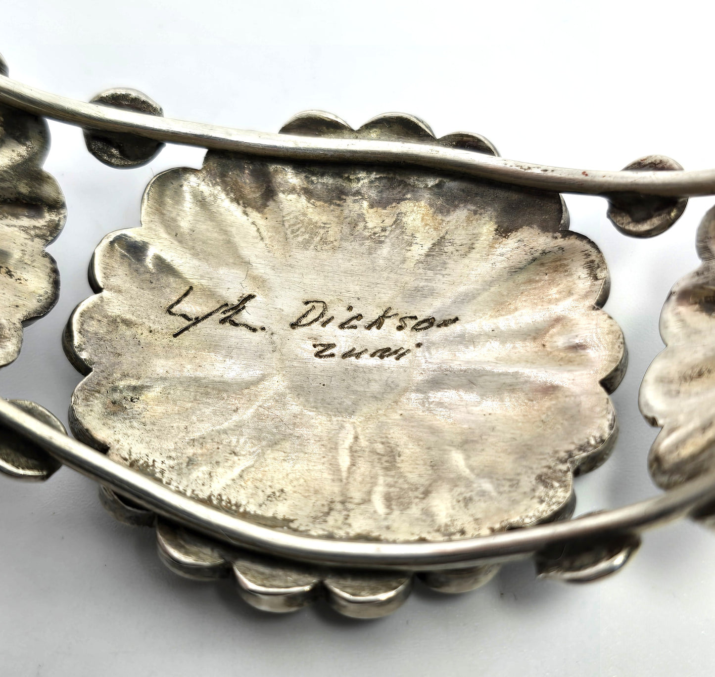 L.L. Dickson Larry and Lorinda Natie American Zuni Sterling sun face cuff bracelet