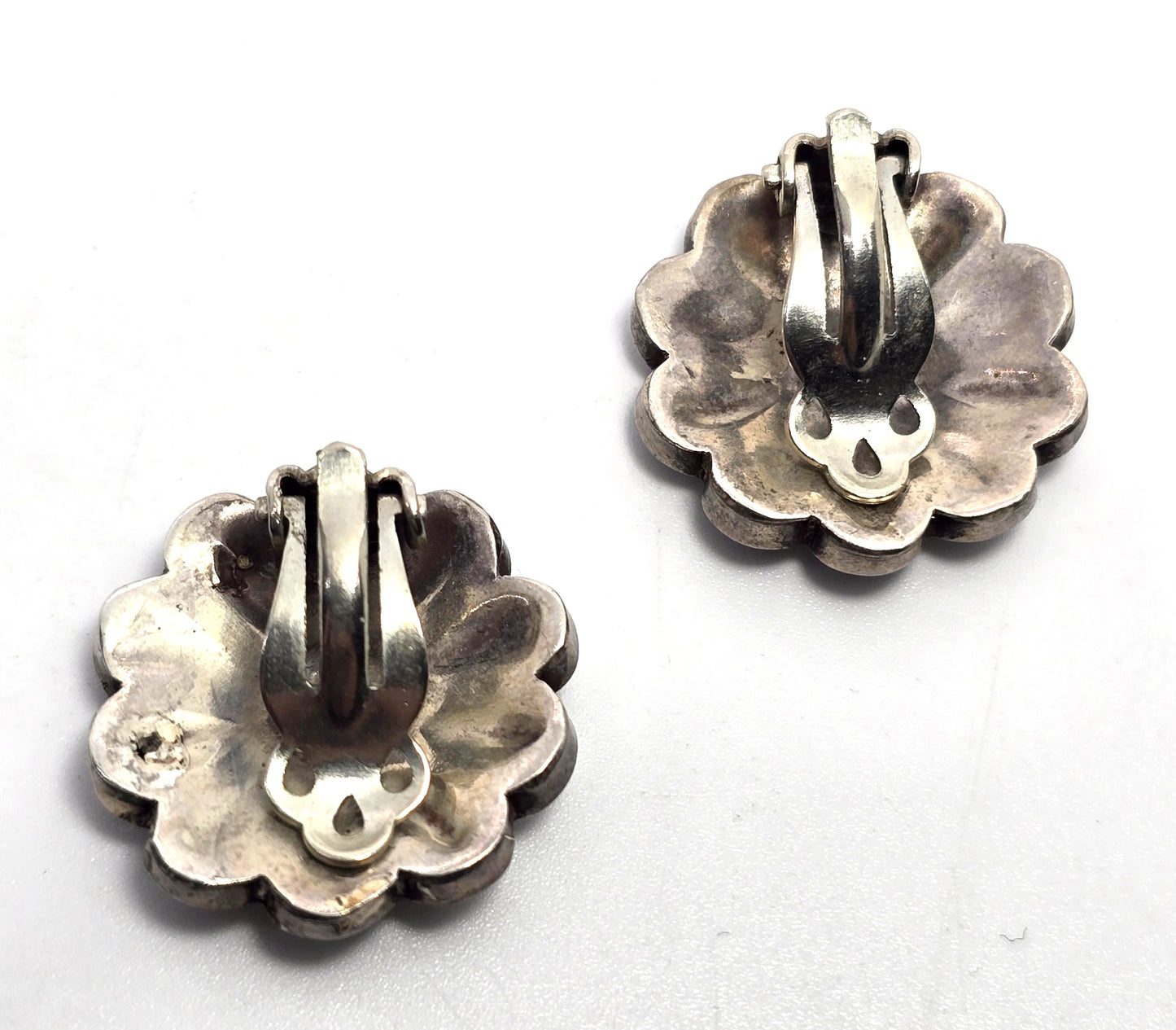 L.L. Dickson Larry and Lorinda Natie American Zuni Sterling sun face earrings