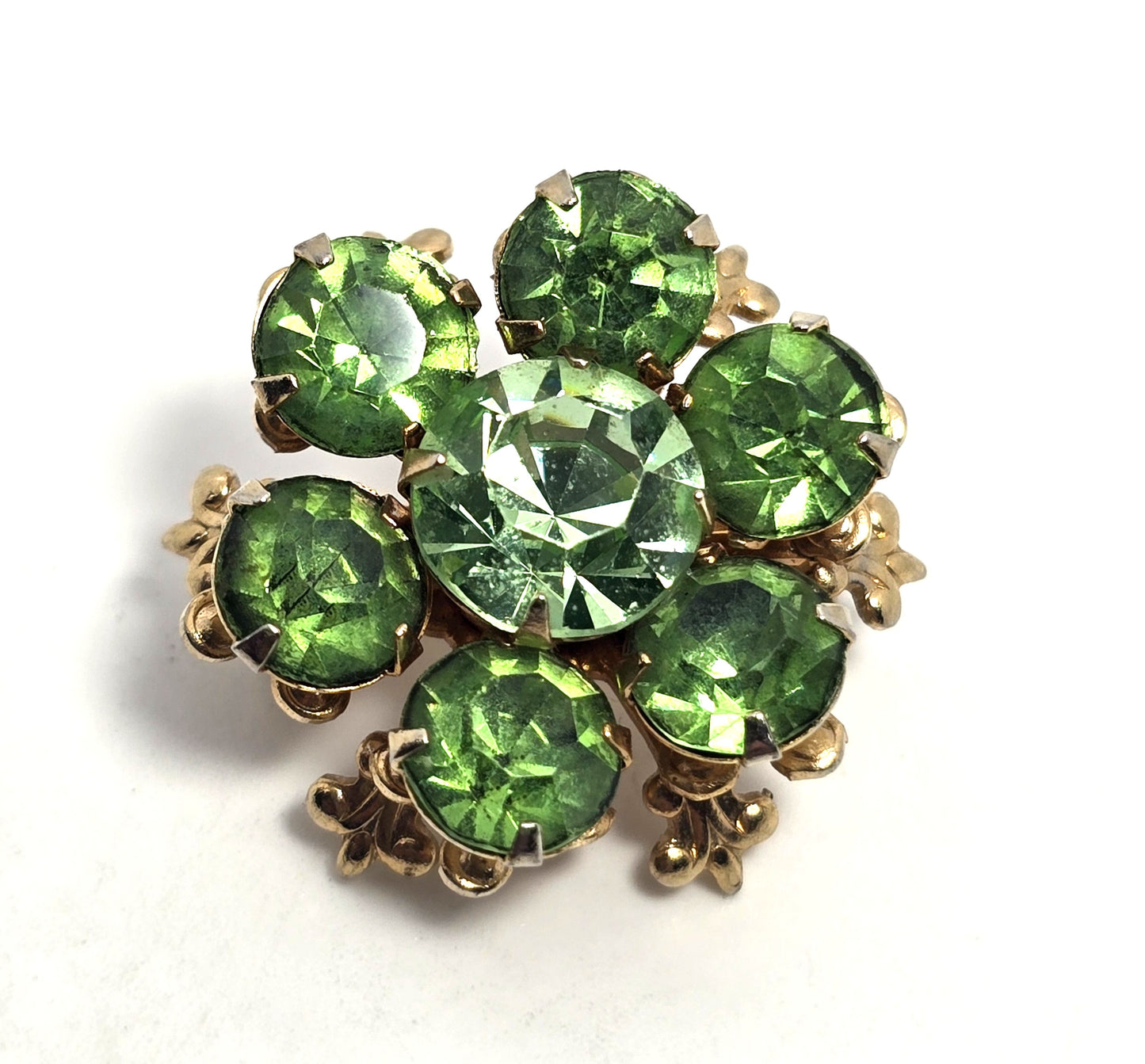 Green uranium glass rhinestone gold toned small flower UV glow vintage brooch