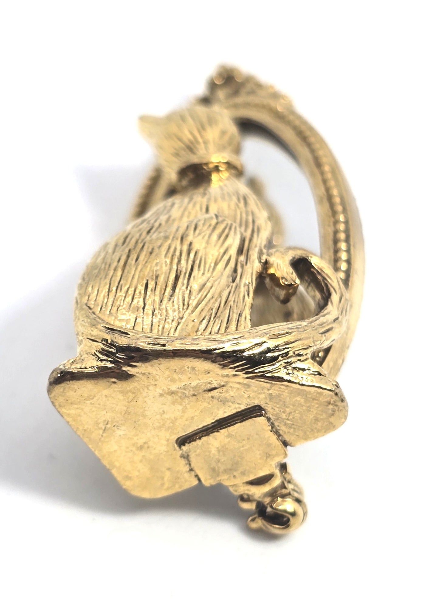 Cat looking in mirror gold toned detailed vintage cat brooch