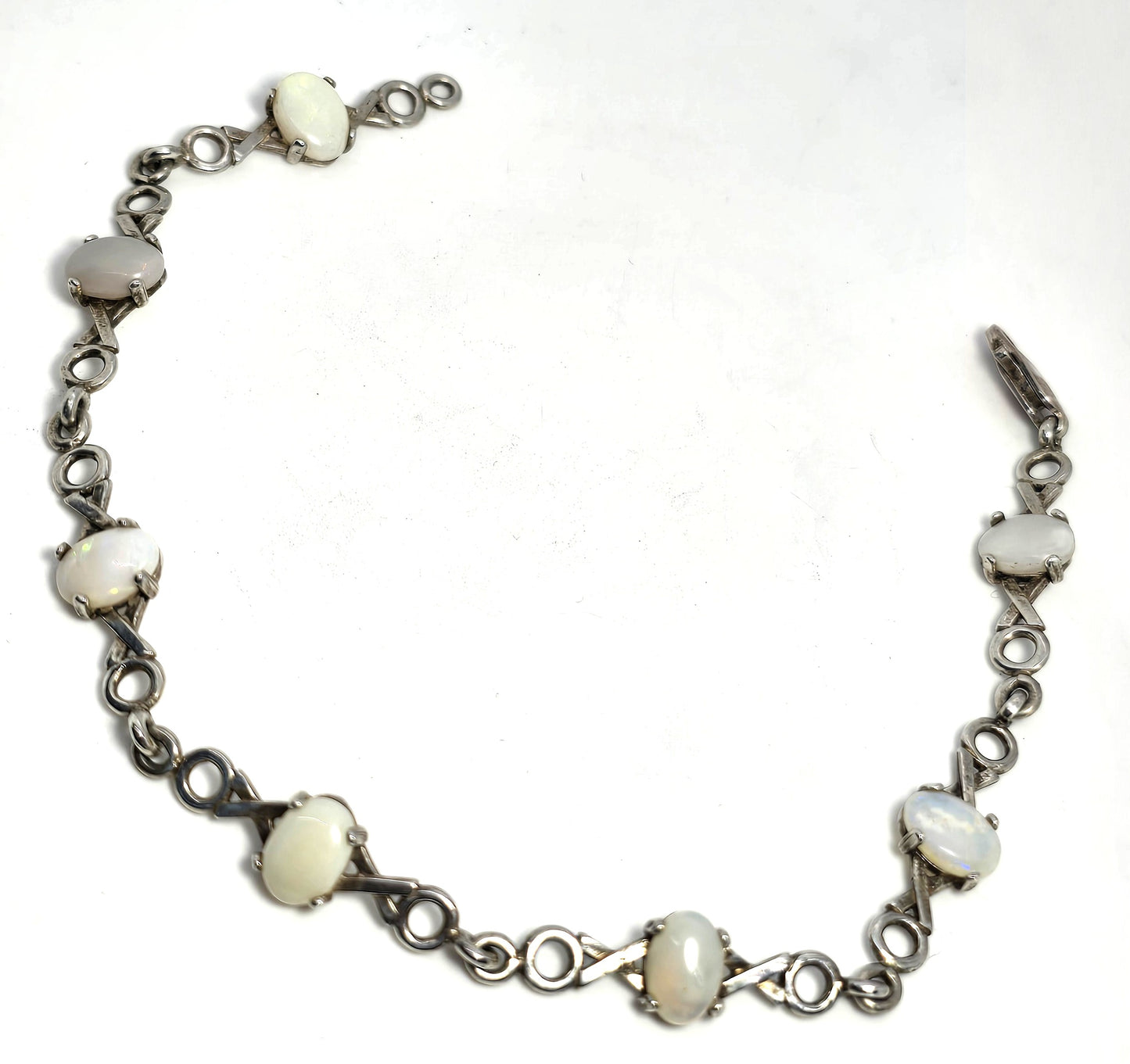 White opal 7 stone X and O sterling silver vintage tennis bracelet