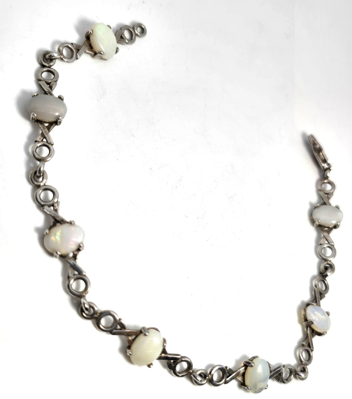 White opal 7 stone X and O sterling silver vintage tennis bracelet