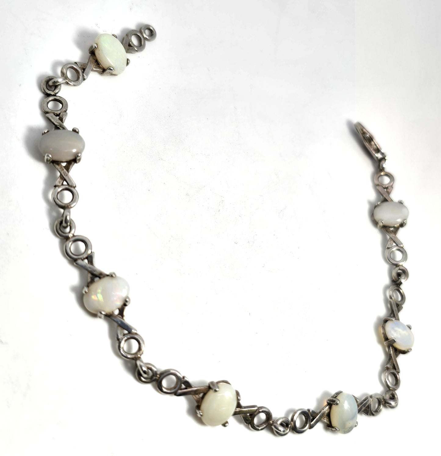 White opal 7 stone X and O sterling silver vintage tennis bracelet