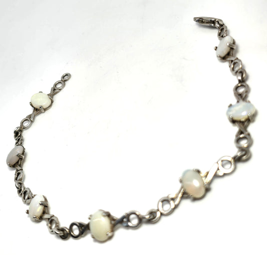 White opal 7 stone X and O sterling silver vintage tennis bracelet