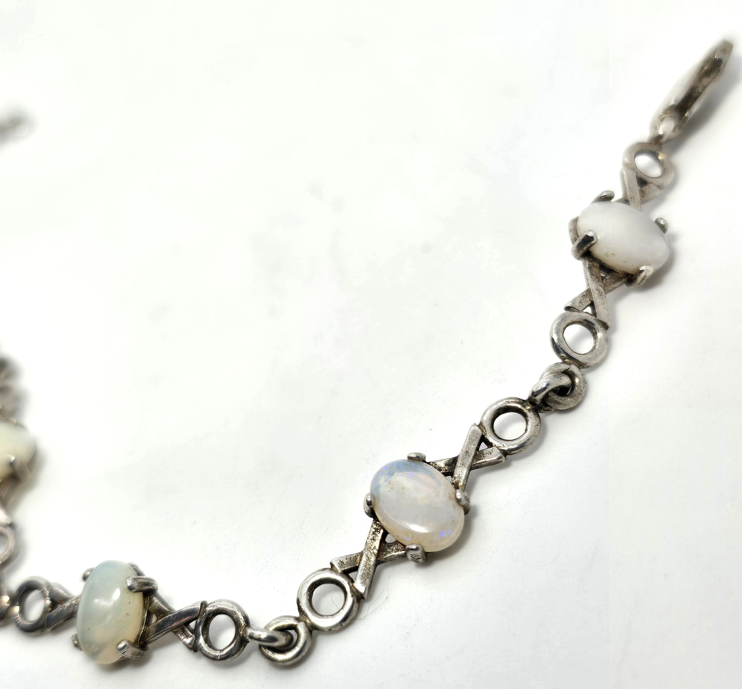 White opal 7 stone X and O sterling silver vintage tennis bracelet
