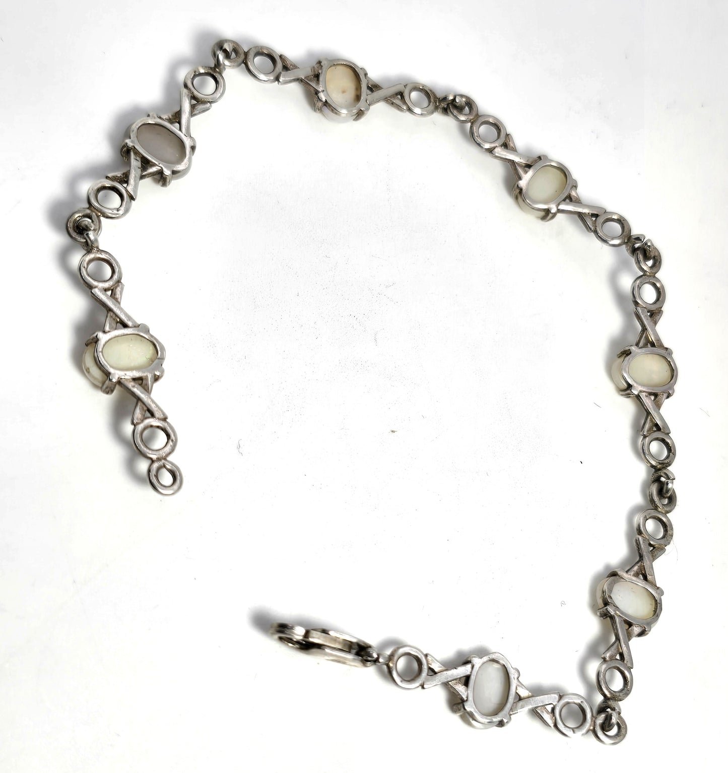 White opal 7 stone X and O sterling silver vintage tennis bracelet