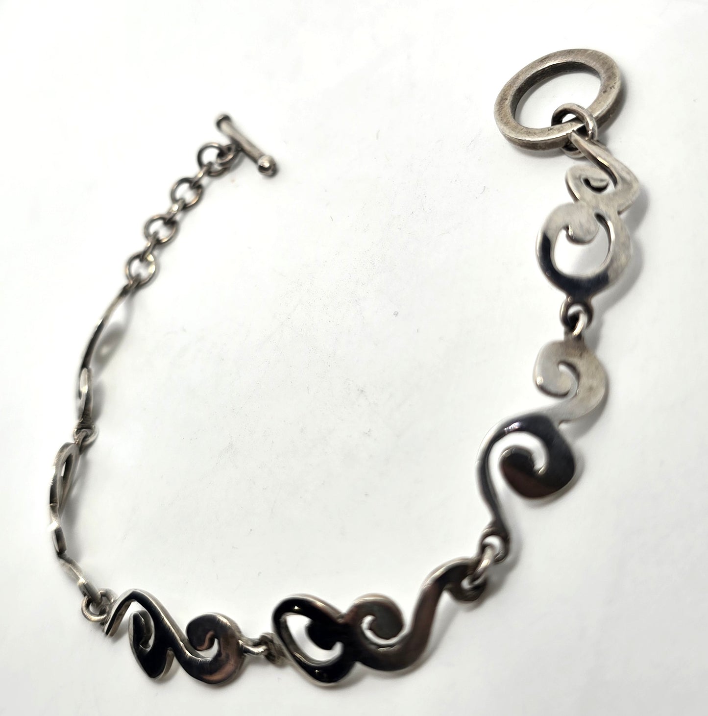 Barse Filigree swirl linked panel signed toggle tennis bracelet